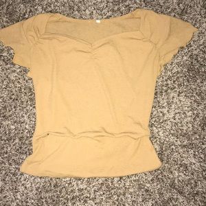 yellow/gold short sleeve shirt